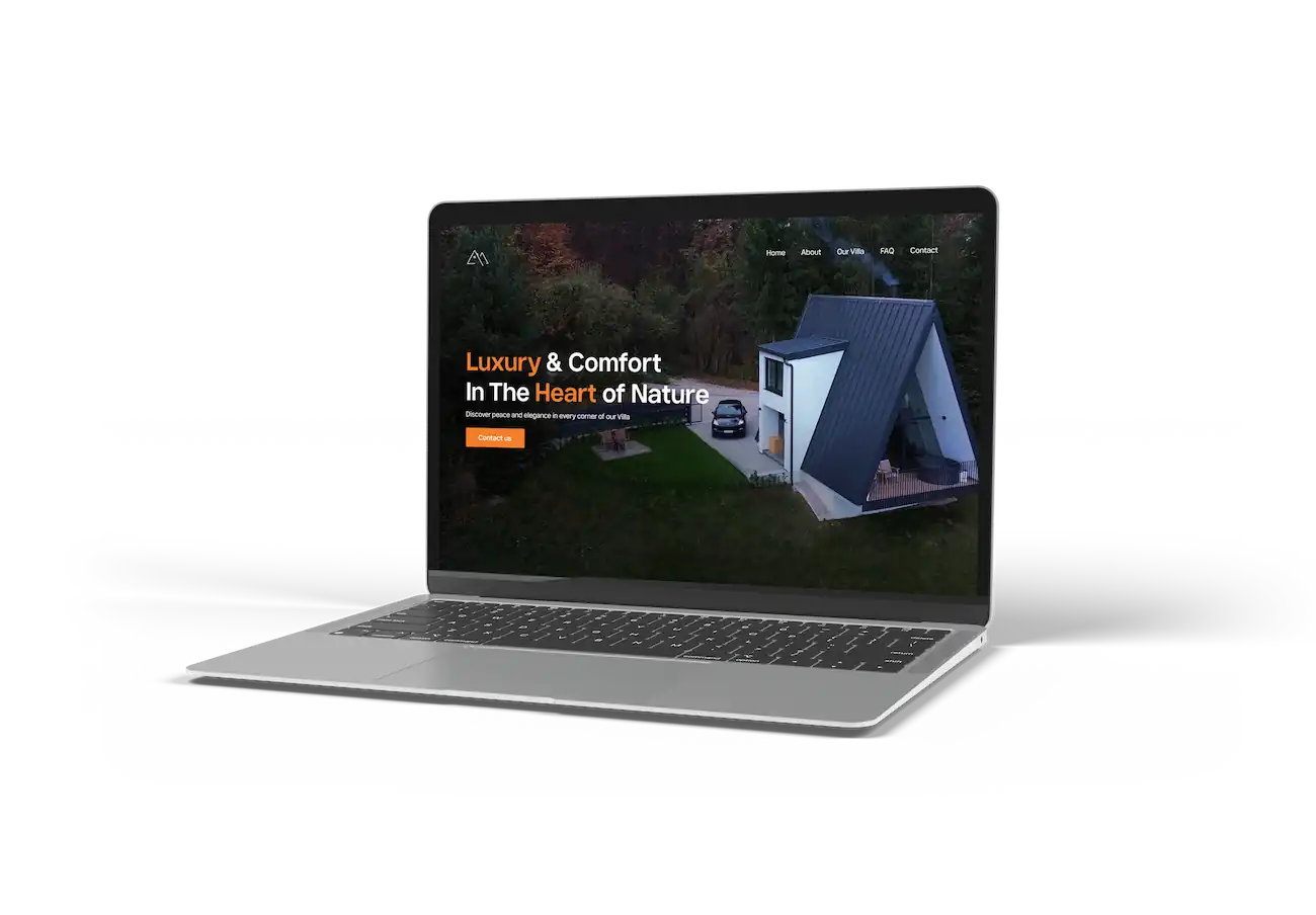 Laptop that displays the landing page of Elegance Barbershop